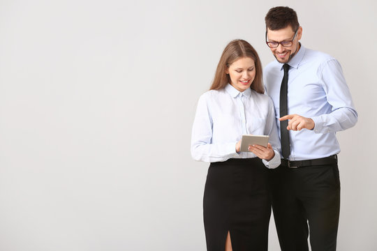 Business People Discussing Something On White Background