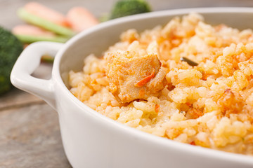 Dish with tasty rice on table, closeup