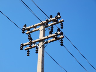 New electricity poles and high voltage cables on the poles Replacing the electric pole With a new...