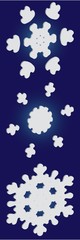 Set of isolated falling snowflakes on blue background.