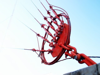 Large steel wire rope installed on the cement floor, holding the radio transmitter, TV, 3G, 4G...