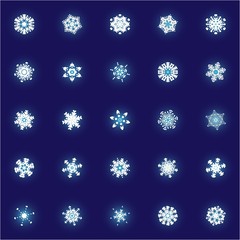 Set of isolated falling snowflakes on blue background.