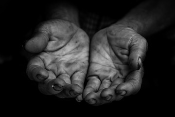 hands poor old man or beggar begging you for help sitting at dirty slum. concept for poverty or hunger people,human rights,donate and charity for underprivileged children in third world  - obrazy, fototapety, plakaty