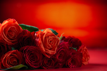 Red roses with a red background, congratulations on Valentine's Day, happy birthday, or happy love day. Romance, postcard