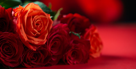 Bouquet of red roses, congratulations on Valentine's Day or mother's day, or March 8. Red background