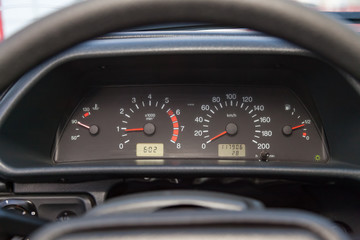 Vintage retro car dashboard with analog speedometer, tachometer and odometer, handmade for restoration