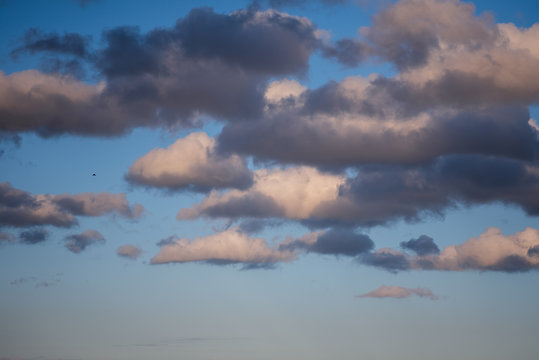 Clouds hovering against blue skyline
