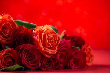 Bouquet of red roses, congratulations on Valentine's Day or mother's day, or March 8. Red background