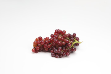 Selective focus red grape on white background
