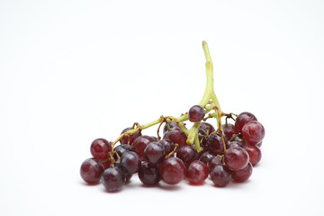 Selective focus red grape on white background