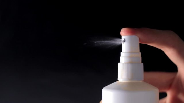 White spray bottle sprays aerosol / 40% slow-motion