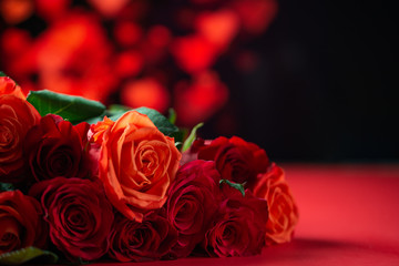 Romantic red roses on a red background with hearts, Valentine's day, love and romance, wedding background