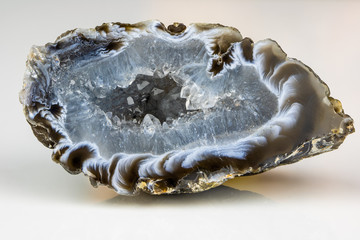 A sliced and polished stone of quartz and agate. Concept: rocks and minerals