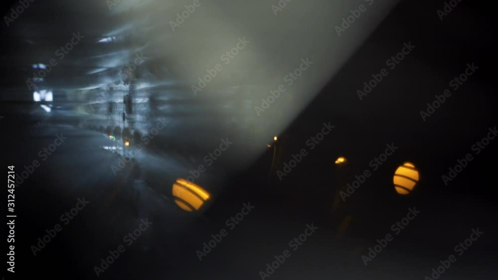 Poster close-up of blurred lights inside computer processor. stock footage. blurred faint lights glow in da