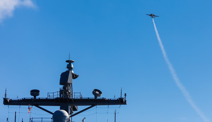 USS Ronald Reagan operates off the coast of Rockhampton, Australia during Exercise Talisman Sabre.  A E-2 Hawkeye flies over the ship waiting to land