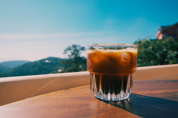 A glass of ice americano in coffee cafe Mountain View