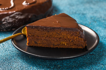 cake slice. Traditional Austrian chocolate dessert. Homemade baking. Selective focus, close-up.