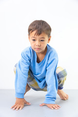 Portrait of a young boy on a white background