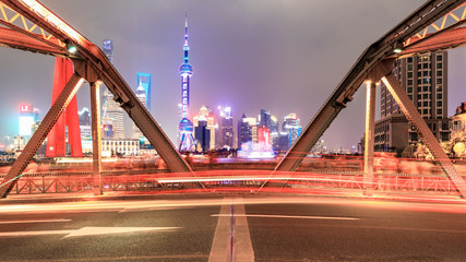 Architectural landscape and colorful lights at night in Shanghai
