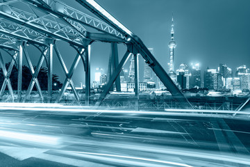 Architectural landscape and colorful lights at night in Shanghai