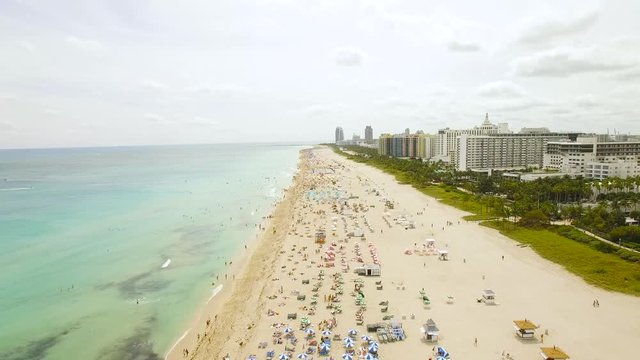 Aerial Shot of South Beach with Beach Chairs and Ocean