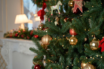 Christmas mood, Christmas tree, merry holidays. Christmas gift box, Blurred background, bokeh.