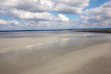 Low tide in the bay in front of Mont Saint Michel in Normandy, France.