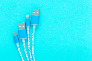 charging cable for smartphone on blue background