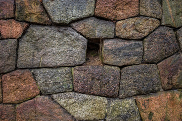 Wall of an old fortress made of large hewn stones