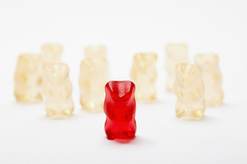 Group of gummy bears with one bear being excluded