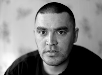 portrait of a man on black and white