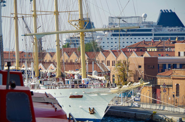 Luxury sailing yacht boat windjammer Star Flyer docked in Port of Venice, Italy with other cruise...