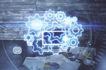 Multi exposure of business theme icons and work space with computer background. Concept of success.