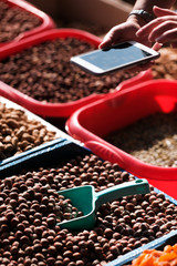 make food photo. Take photos of dried fruits on the phone. Mobile photography