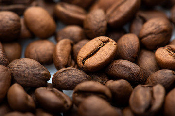 Coffee beans close-up background. Fresh roasted
