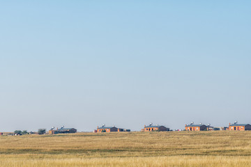 Fototapeta na wymiar Farm scene, with farm worker houses, near Winburg