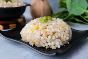 Indian Food dish made out of Sago called Sabudana khichdi, Usually eaten during fasting days. Recipe Ingredients along with copy space