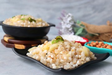 Indian Food dish made out of Sago called Sabudana khichdi, Usually eaten during fasting days. Recipe Ingredients along with copy space