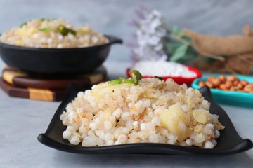 Indian Food dish made out of Sago called Sabudana khichdi, Usually eaten during fasting days. Recipe Ingredients along with copy space