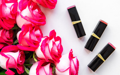 Lipsticks and red roses