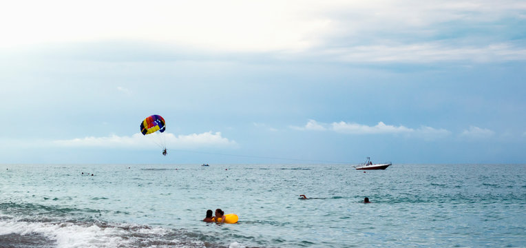 Parasailing is a popular pastime in many resorts around the world. Active form of relaxation