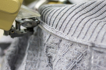 modern machine for connecting knitted parts in the process of work