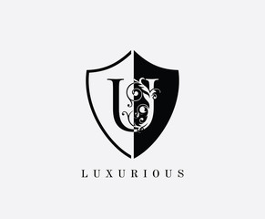 Vintage U Shield Letter Logo Icon. Black and White U With Classy Leaves Shape design perfect for fashion, Jewelry, Beauty Salon, Cosmetics, Spa, Hotel and Restaurant Logo. 