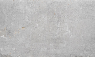 Texture of old concrete wall for background. White concrete wall background with a cracks nad holes.