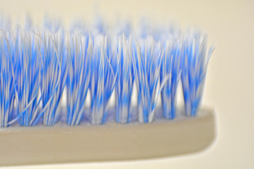 close up blue and white tooth brush, tooth brush with white background