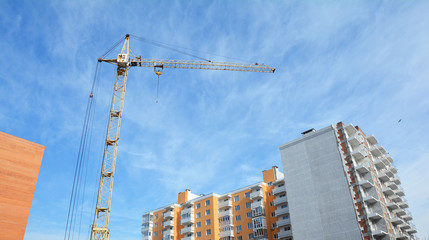 Cranes construction with beautiful clouds sky panorama. Building construction growth and global construction industry and gdp growth concept