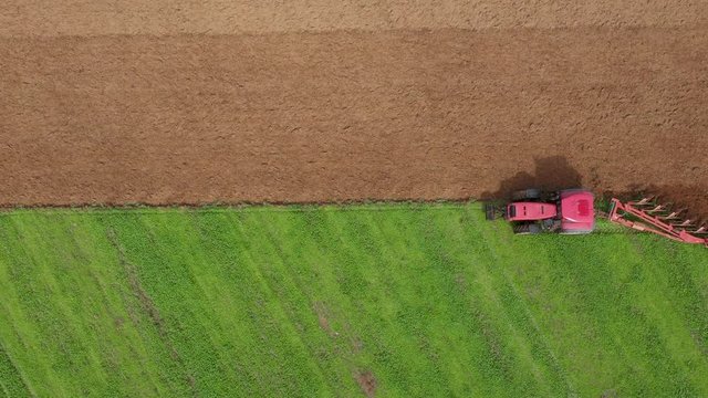 Tractor Plow Field Prepares Agricultural Land For Planting Crop Aerial Top View