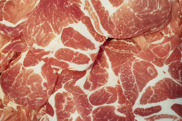 closeup top view detail sliced raw ​​pork in texture background