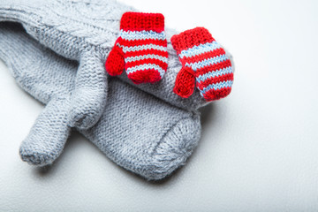 wool gloves white leather background 