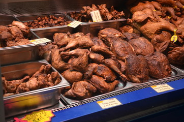 Varieties of cured sausage salami pressed meat, dried meat in the Centraltirgus, largest food market in the Baltic States